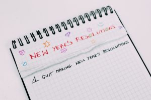 written on paper, stop making a resolution for the new year